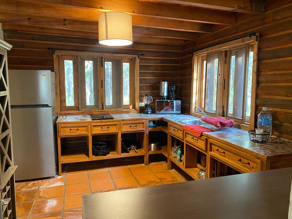 VENTA DE TERRNO Y CABAÑAS AMUEBLADAS